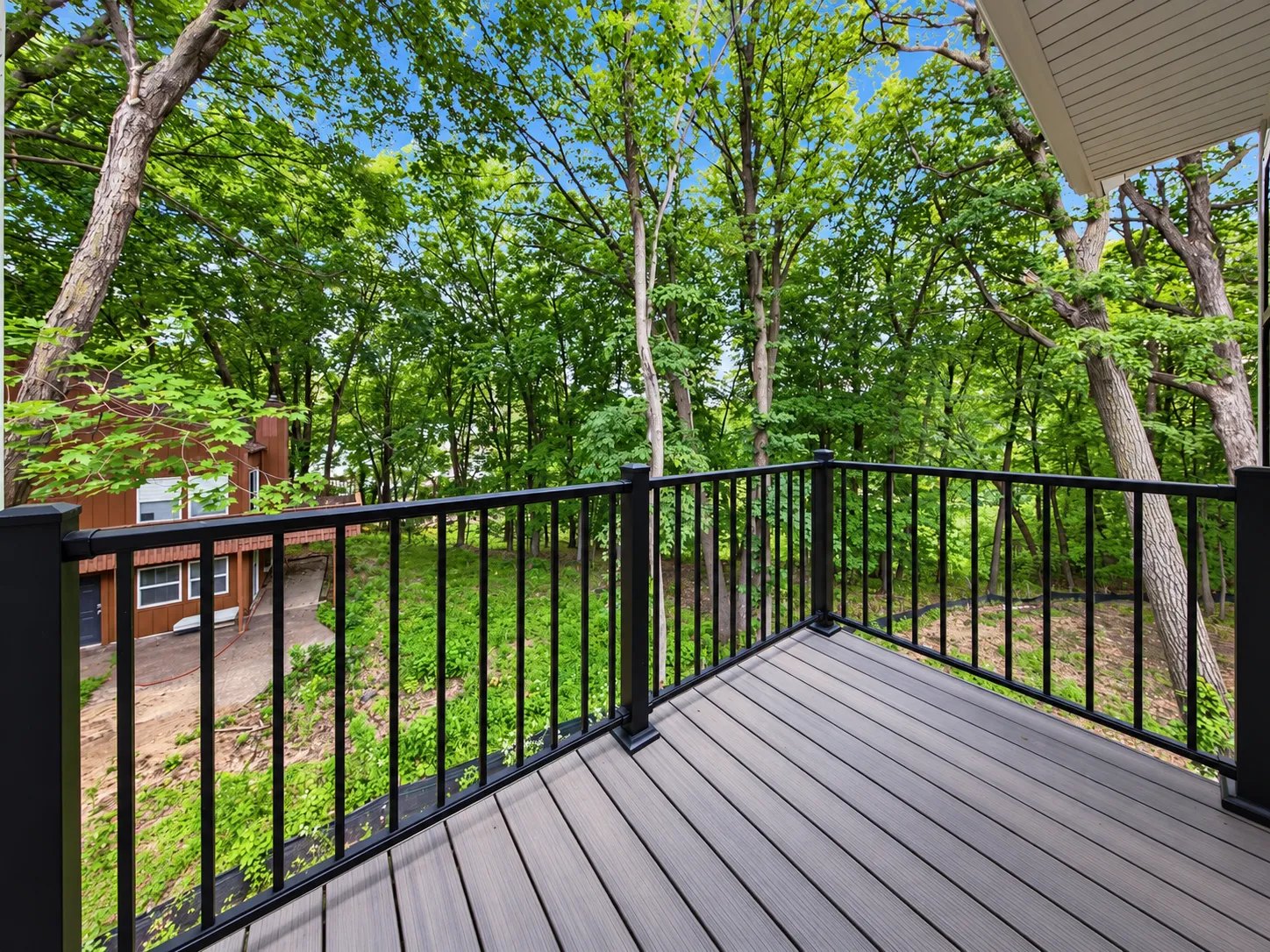 Deck overlooking the wooded lots at Excelsior Woods